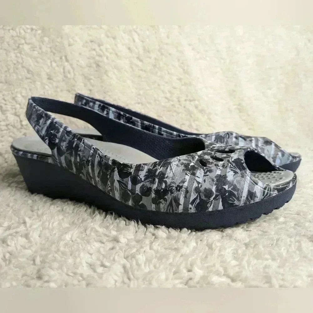 CROCS Wedge Sandals size 6 US  Blue with leaves pattern